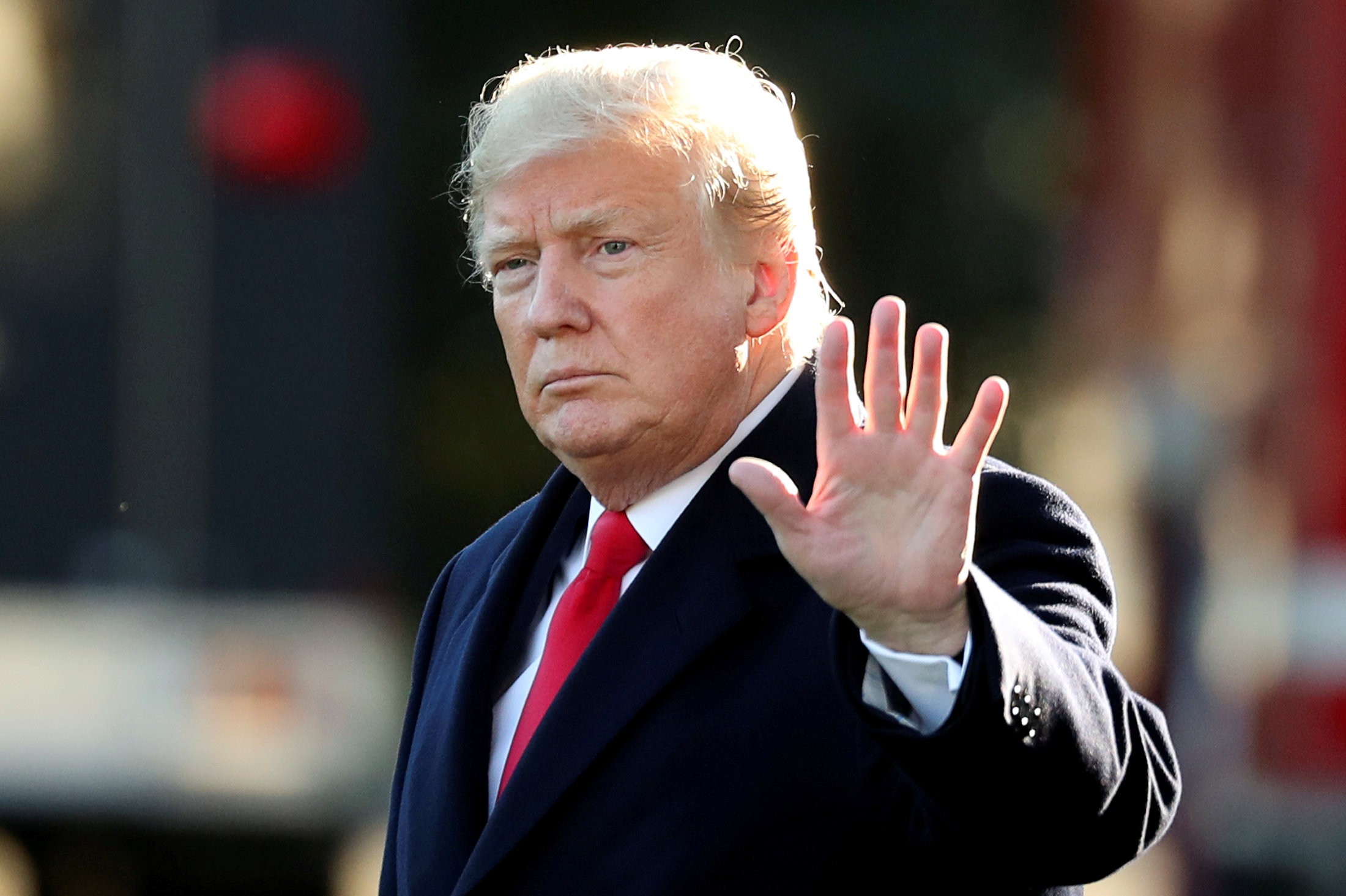 US President Donald Trump waves before leaving the White House for Wisconsin, on October 24, to campaign for Republican Senate candidate Leah Vukmir in the midterm elections. Photo: Reuters