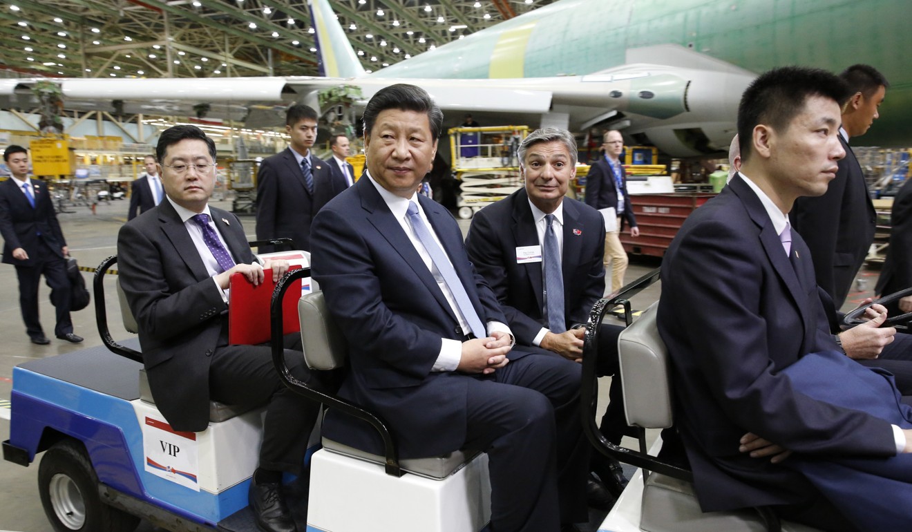 Chinese President Xi Jinping is pictured with then Boeing CEO Ray Conner during a tour of the Boeing assembly line in Washington state in 2015. Photo: AP