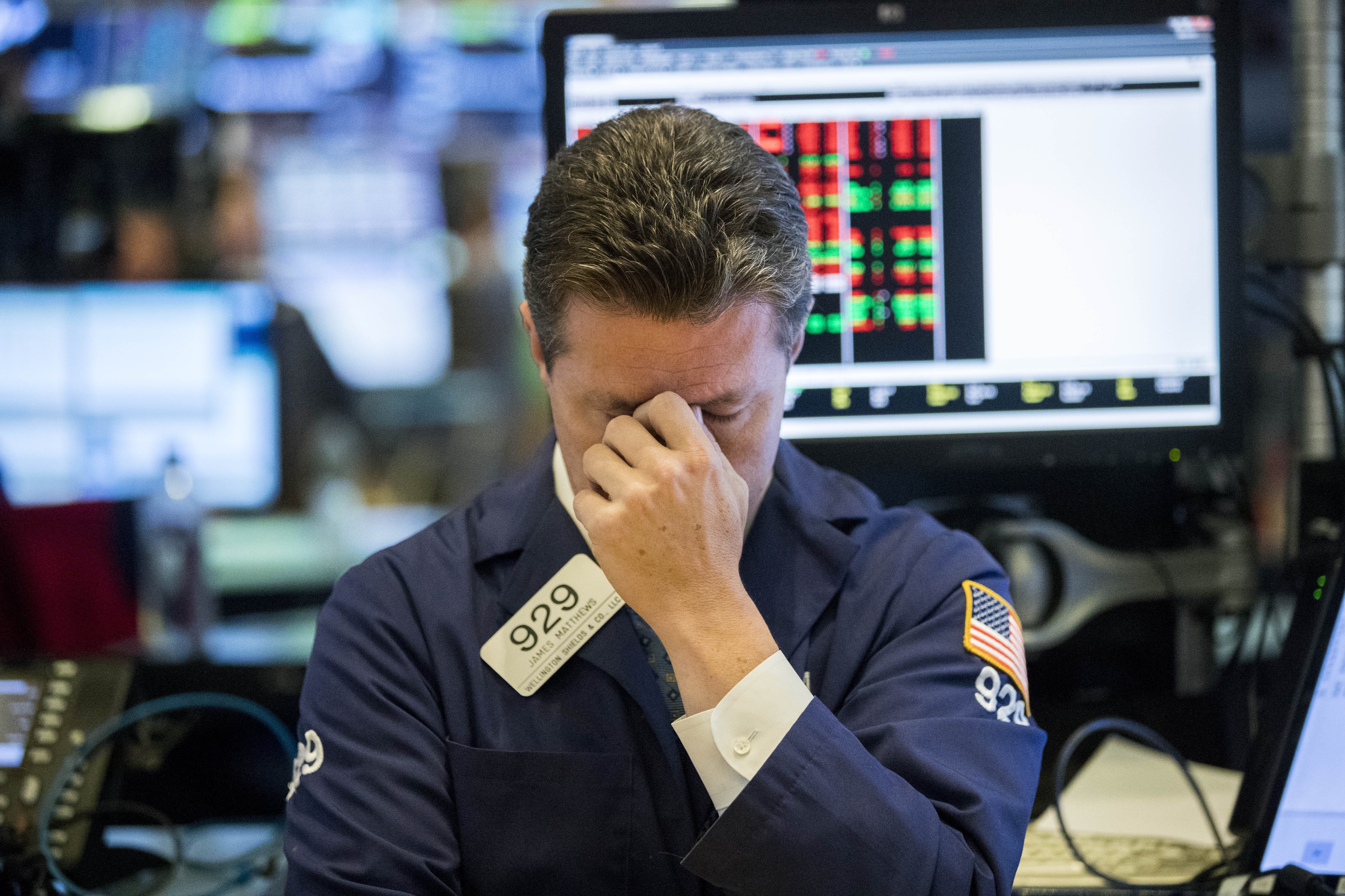 A trader reacts at the New York Stock Exchange on October 11 when US stocks extended deep losses in volatile trading. Photo: Xinhua