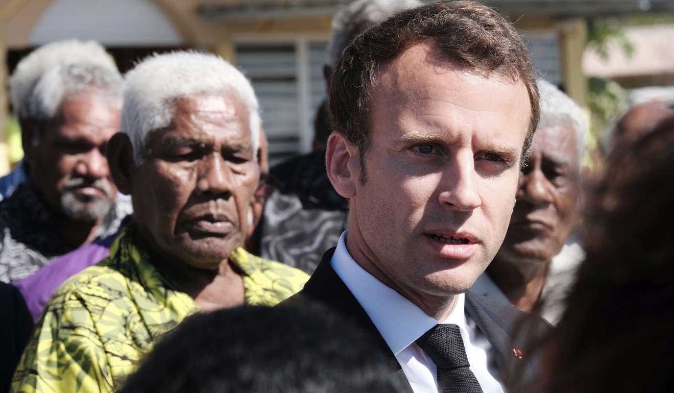 A May, 2018 photo of French President Emmanuel Macron arriving at Ouvea Island airport off New Caledonia. Photo: AP