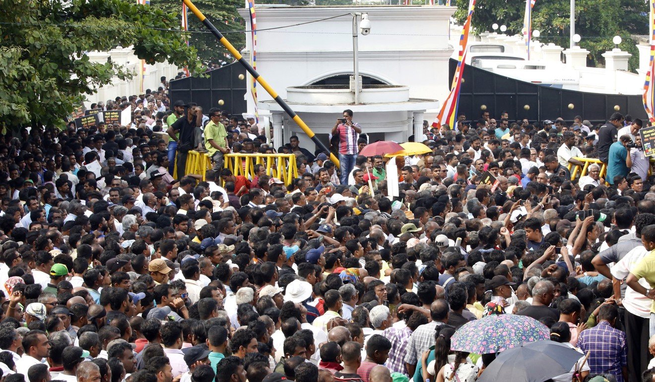 Wickremesinghe supporters taking part in a rally near the Prime Ministerial residence in Colombo, Sri Lanka. Photo: EPA