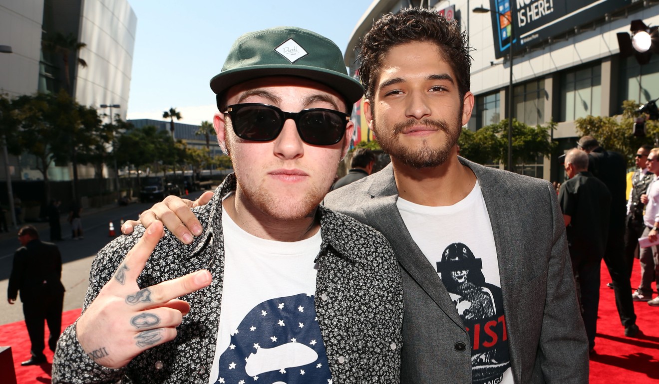 n this file photo taken on September 6, 2012, rapper Mac Miller (left) and actor Tyler Posey arrive at the 2012 MTV Video Music Awards at Staples Centre in Los Angeles, California. Photo: Agence France-Presse