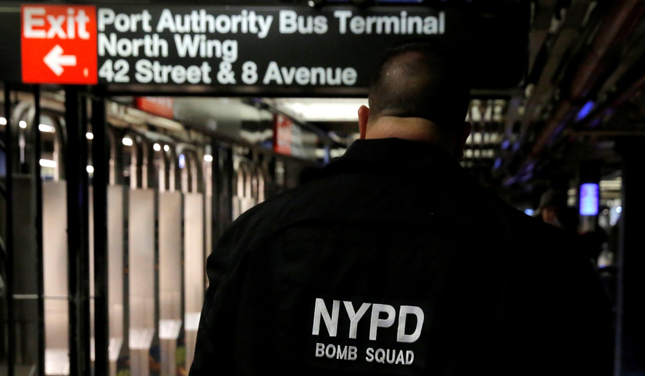 A member of the New York Police Department's Bomb Squad walks through the 42nd Street subway station beneath the New York Port Authority Bus Terminal following an attempted detonation during the morning rush hour last December 11. Photo: Reuters