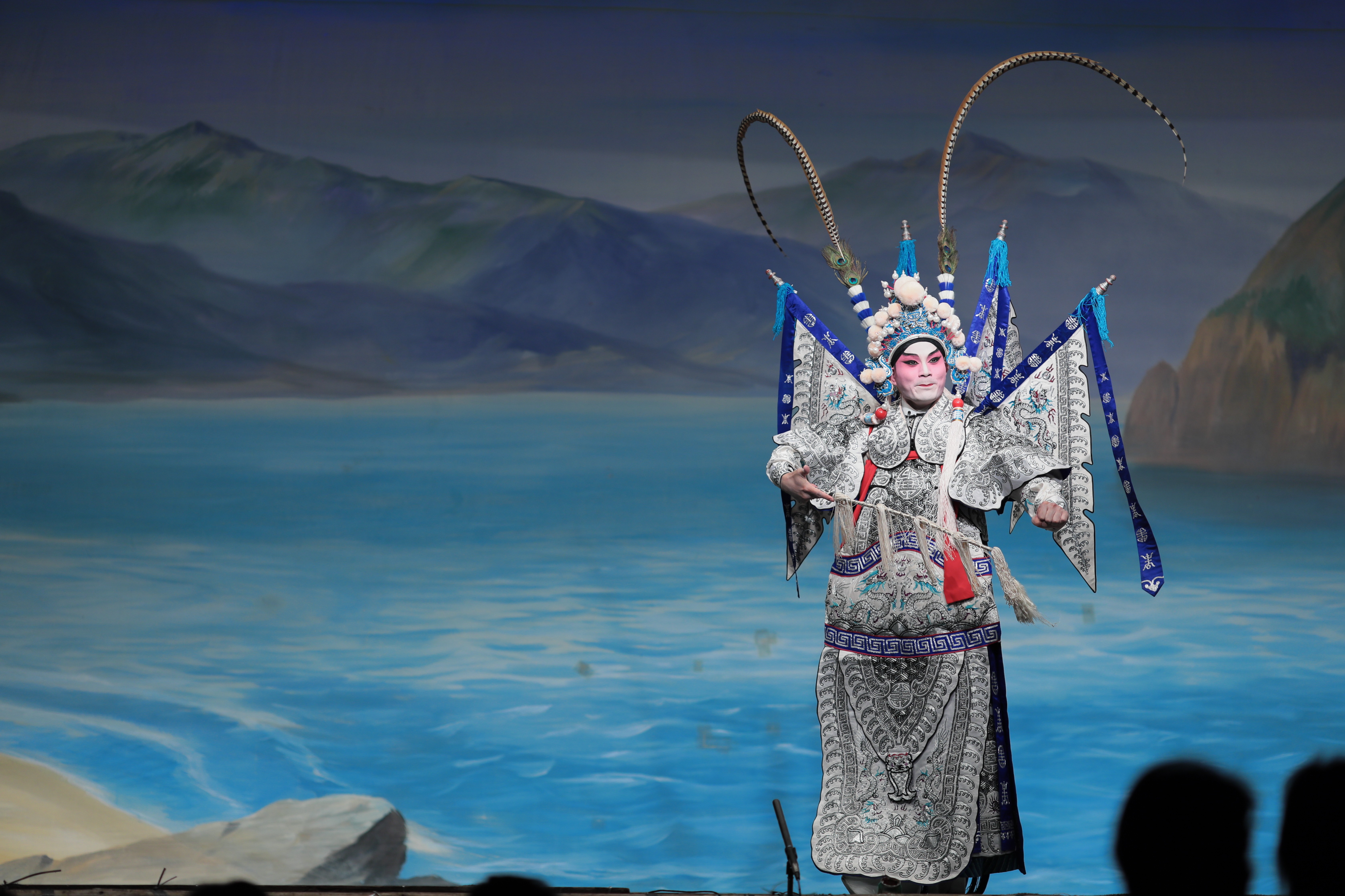 Performers of Cantonese opera, which combines singing, music, acrobatics and martial arts, often use hand and body gestures, eye expressions and footwork to reveal information about the plot.