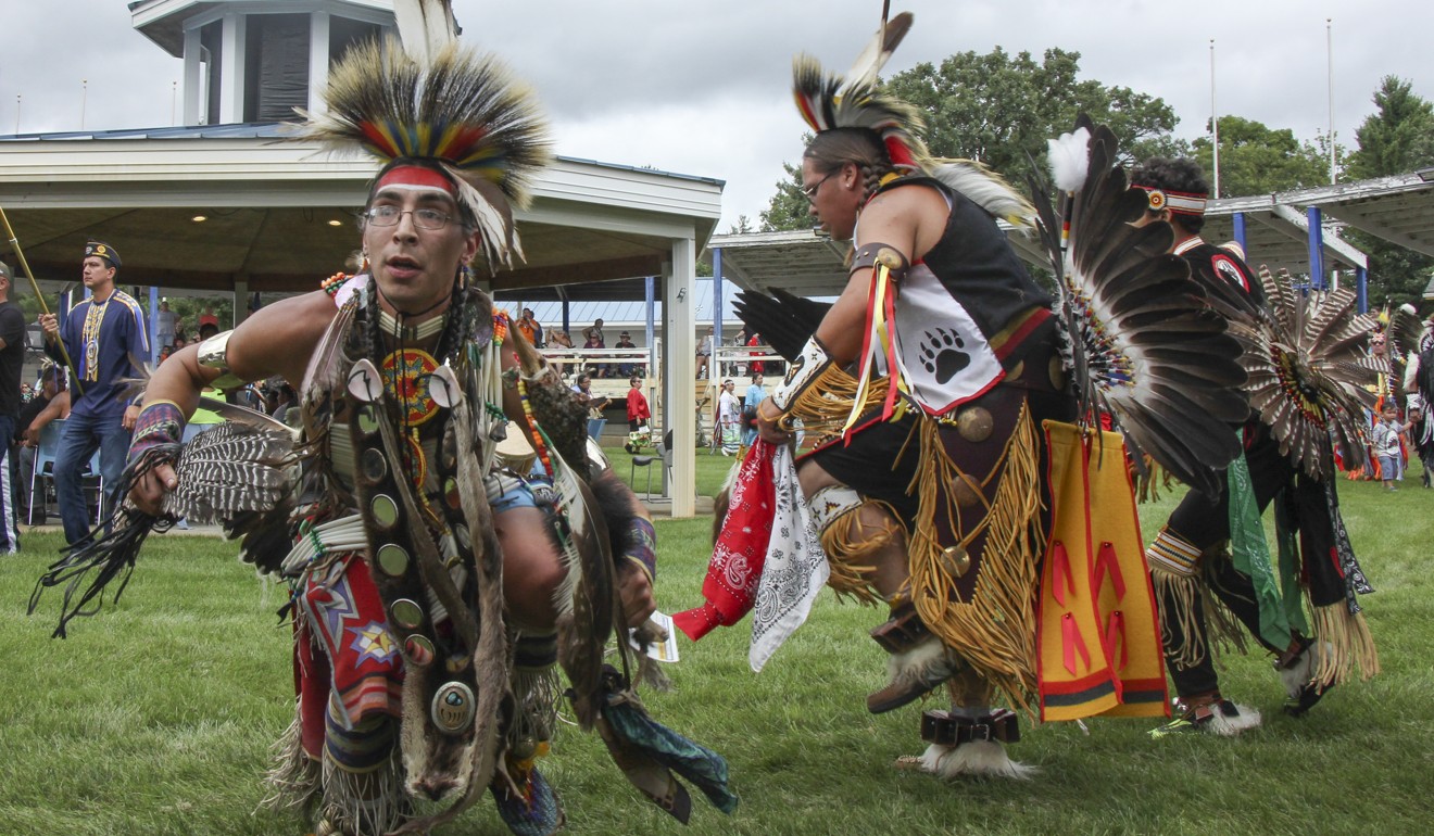Members of the Ho-Chunk tribe dance at the ritual pow-wow.