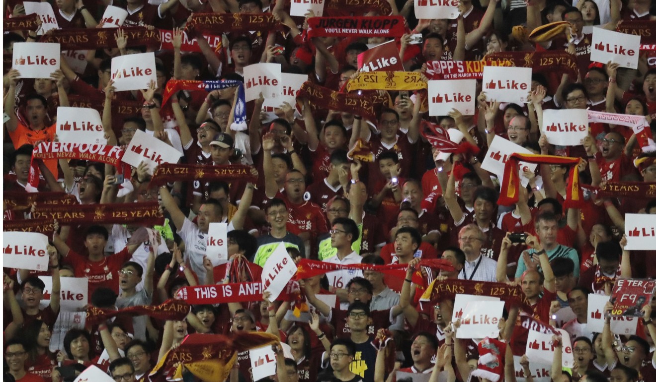 Fans of Liverpool sing during the final against Leicester City at the Premier League Asia Trophy in Hong Kong. Photo: AP