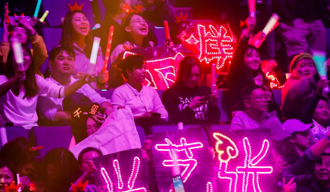 Fans cheer on performers during the Singles’ Day gala show in Shanghai.