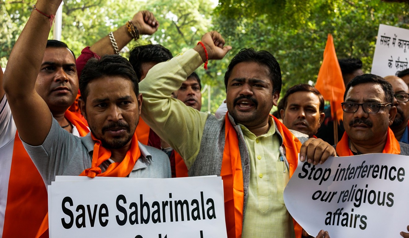 Indian right wing group Hindu Sena shout slogans as they protest against the Supreme Court decision to allow women of all ages to enter Kerala's Sabarimala temple. Photo: AFP