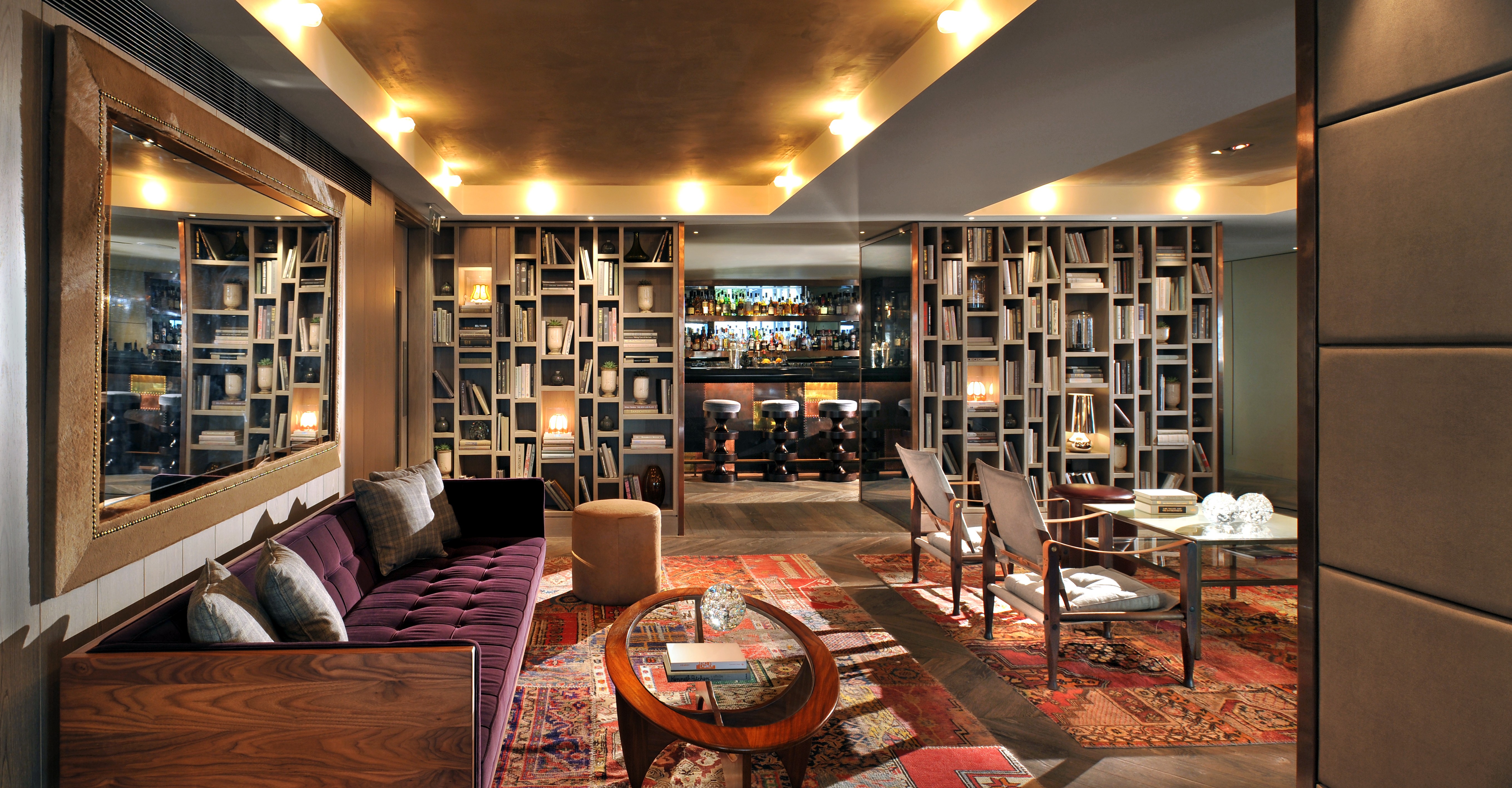 A velvet sofa, paired with a giant lacquer-framed mirror, create a stylish, spacious feel in the lounge bar at boutique hotel, The Hari, in London, created by Tara Bernerd & Partners, which plans to adopt the same approach and use clever space planning and luxurious materials to reflect the vibrant Wan Chai district where The Hari Hong Kong is set to open in 2020.