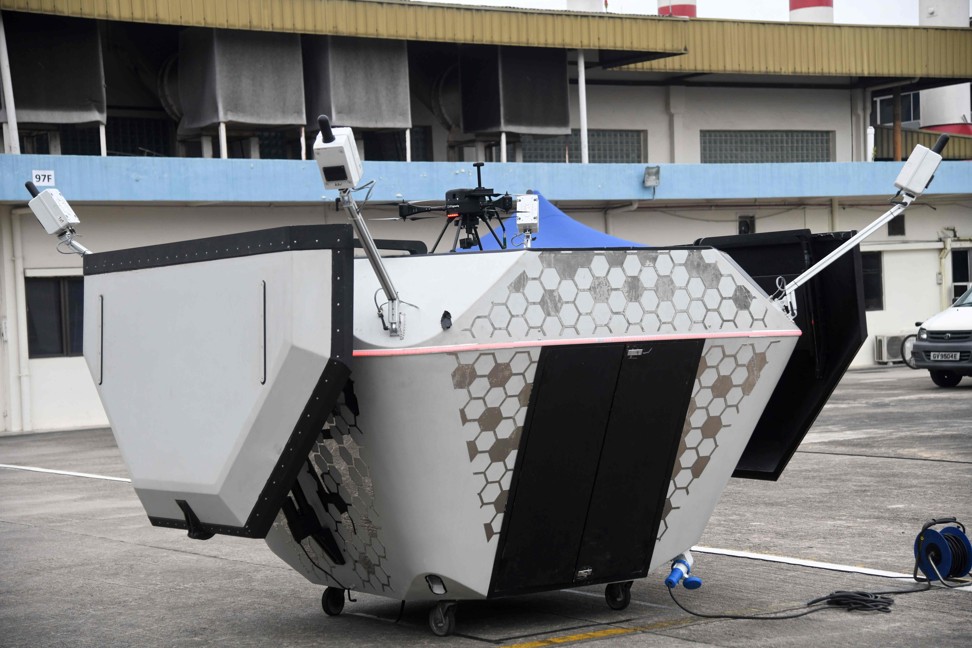 A Singapore Technology Aerospace owned drone on a mobile landing and charging station during a demonstration in Singapore. Image: AFP