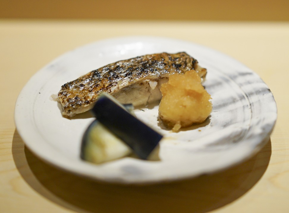 Grilled nodoguro (black throat sea perch) by Japanese chef Saito Takashi’s three Michelin- starred Sushi Saito in Tokyo