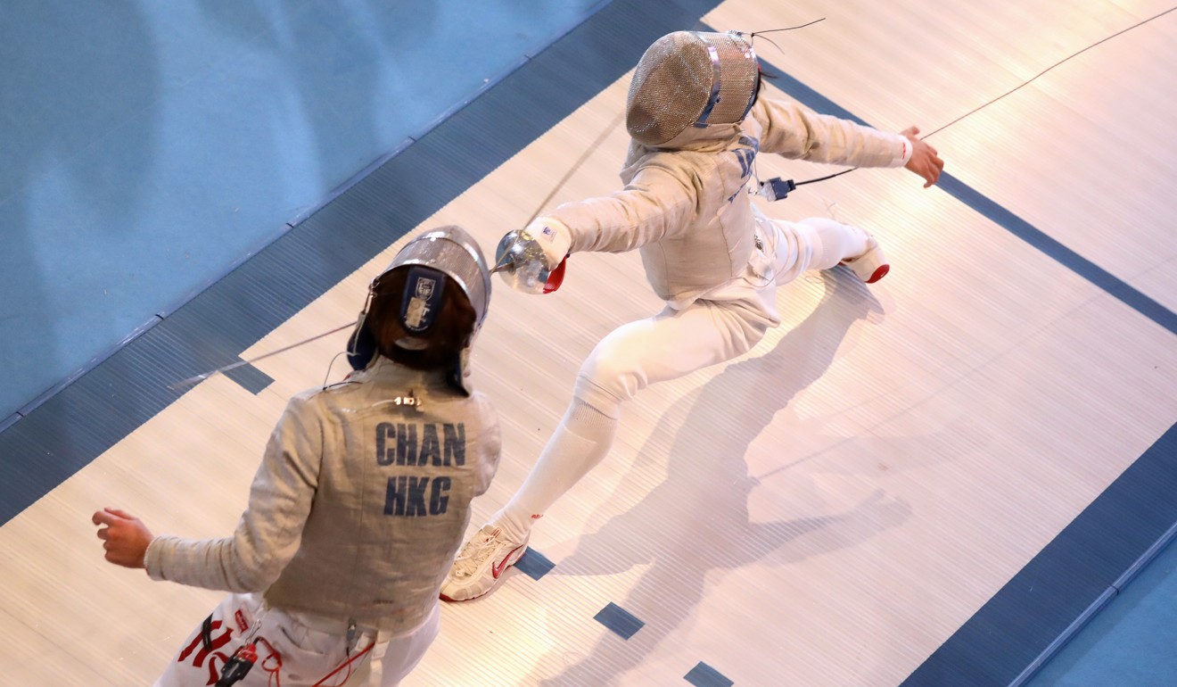 Chan Cheuk-him and Iam Jethro engage in the men’s sabre.