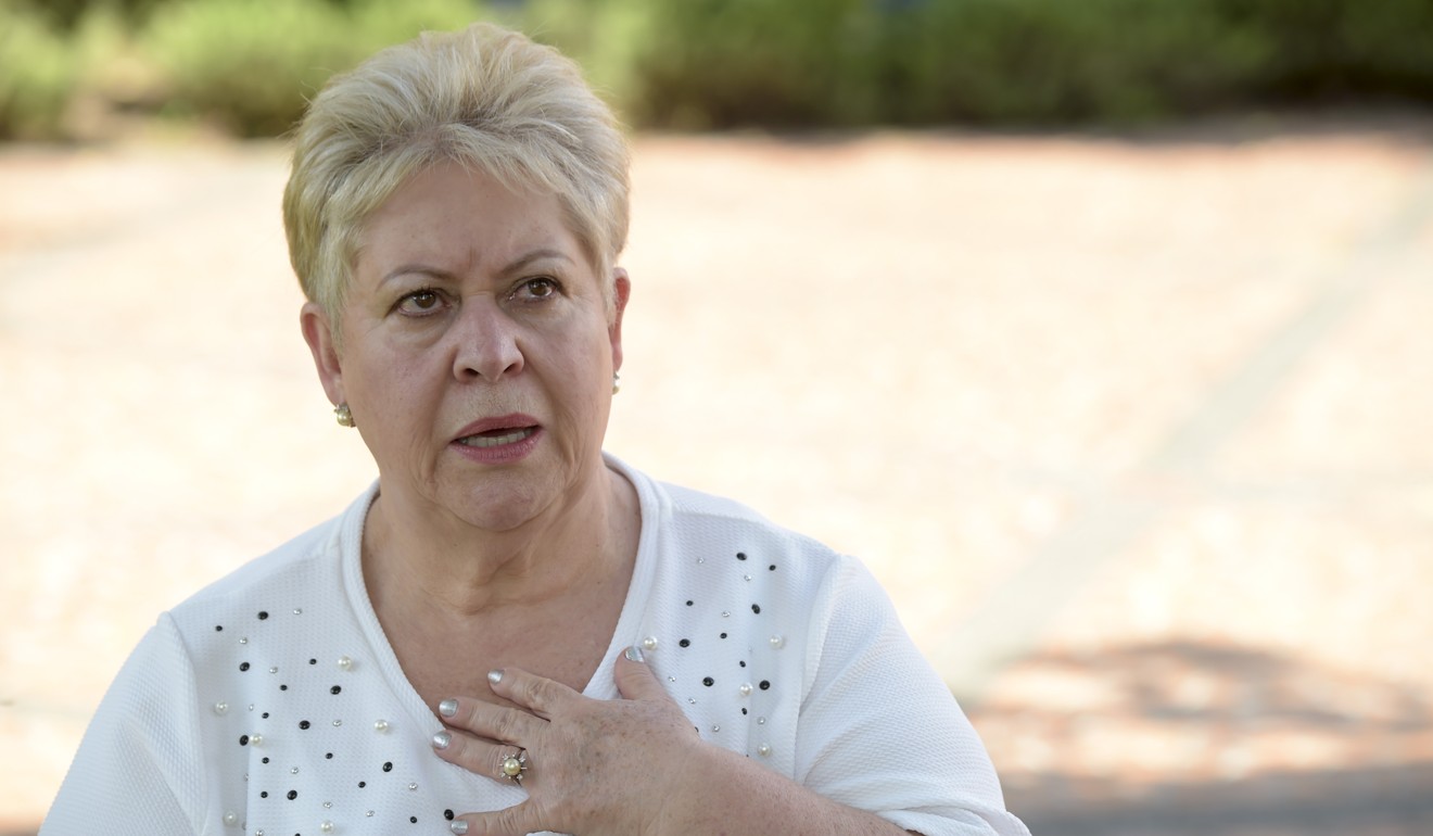 The sister of the Colombian drug lord Pablo Escobar, Luz Maria Escobar, speaks during an interview with AFP during a visit to Escobar’s tomb at the Montesacro cemetery in Medellin. Photo: AFP