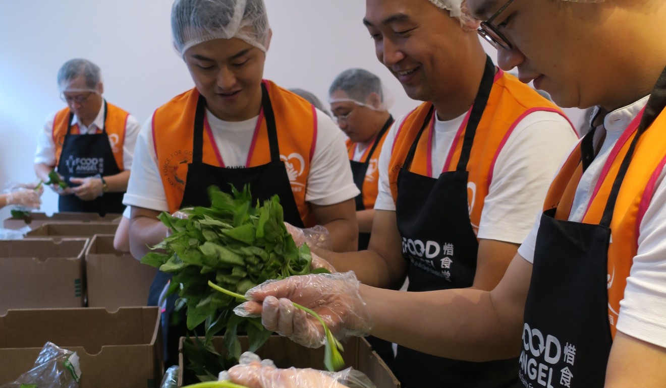 Volunteers prepare food in a community kitchen. Photo: Handout