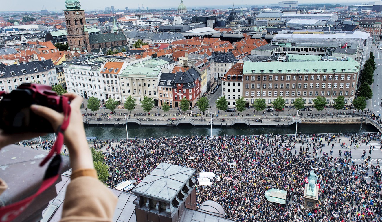 People show their support for refugees and migrants during a rally in Copenhagen on September 12, 2015. Photo: Reuters