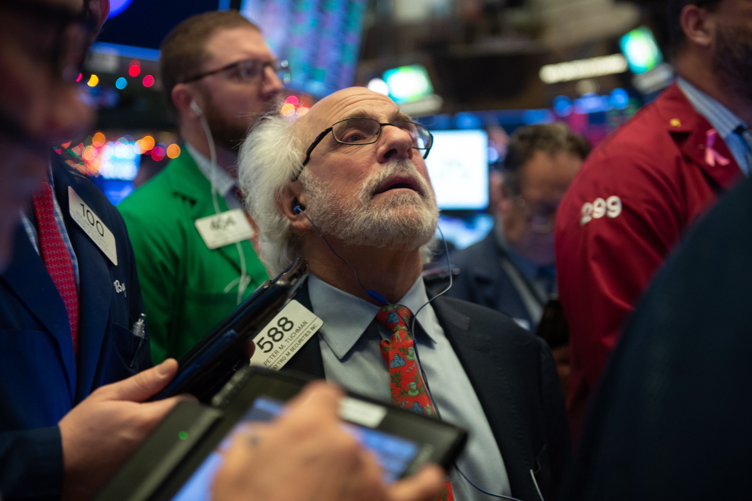Traders work on the floor of the New York Stock Exchange on December 6. A miscommunication from the Fed can have amplified market effects, even if the statements contain a degree of truth. Photo: AFP
