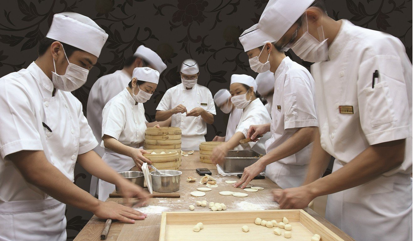 Din Tai Fung’s chefs meticulously make the dumplings.