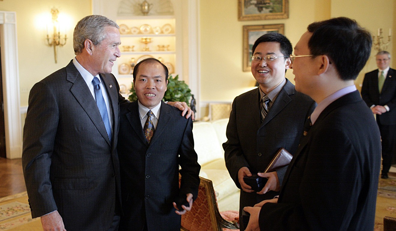US president George W. Bush (left) meets Chinese Christian activists including Wang Yi (second from right) at the White House in 2006. Photo: AFP