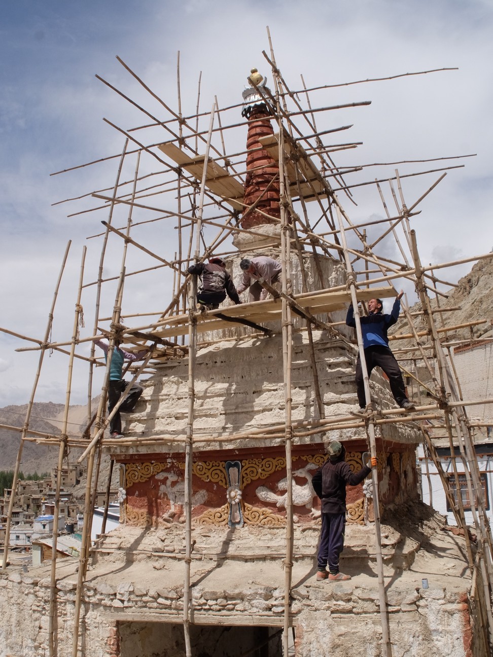 Workers with the Tibet Heritage Fund conserving a traditional building in Leh’s old town. Photo: Tibet Heritage Fund