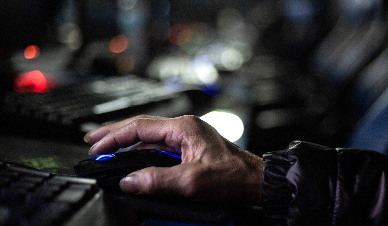 Cyber cafes have emerged as a popular choice over 24-hour fast food chains for the homeless seeking shelter from the night. Photo: Winson Wong