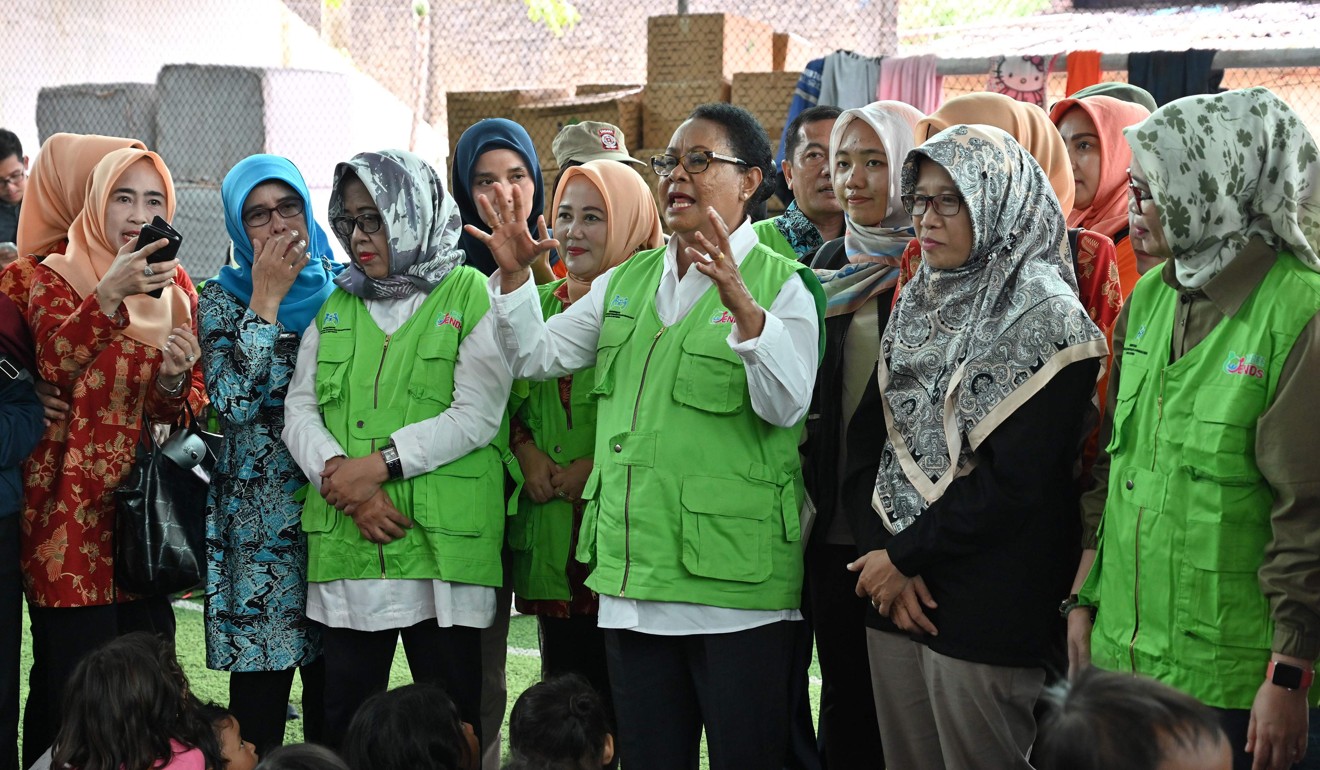 Indonesia's Minister of Women Empowerment and Children Yohana Yembise visits a temporary shelter in Labuhan, Banten Province after the December 22 tsunami that killed more than 400 people. Photo: AFP