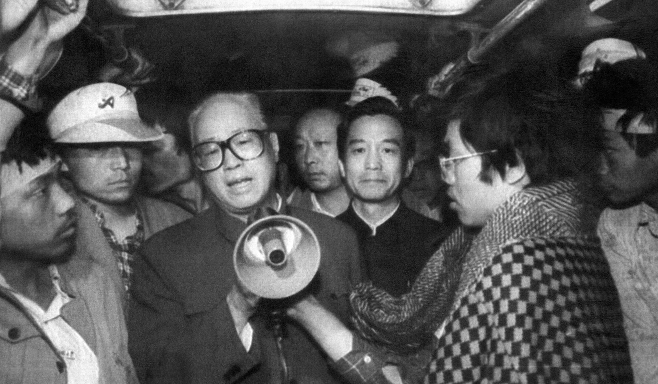 Zhao Ziyang addresses student hunger strikers through a megaphone on May 19, 1989 in one of the buses at Tiananmen Square. Photo: Handout