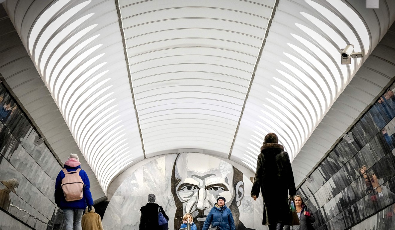 Commuter walk in Dostoyevskaya metro station in Moscow. Photo: AFP