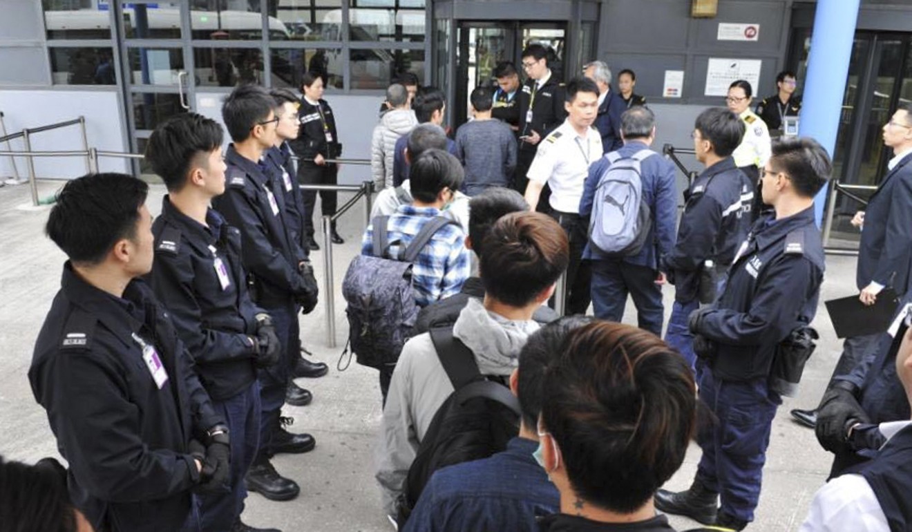Hong Kong immigration authorities arrange a chartered flight to send 68 unsuccessful asylum seekers and illegal immigrants back to Vietnam. Photo: Handout