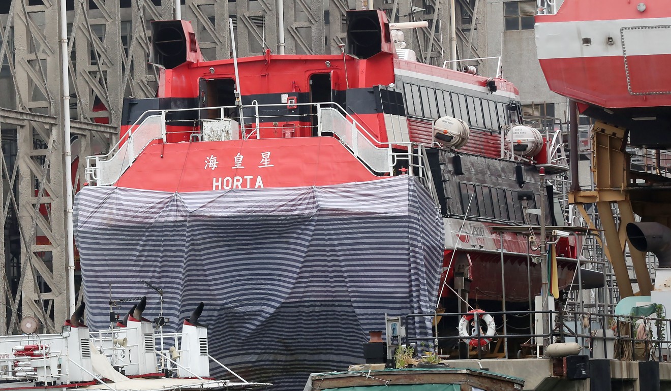 The Jetfoil Horta, that operated a high-speed service to Macau, is towed to Cheung Sha Wan dock for inspection after an accident that injured 124 people in 2015. Photo: Edward Wong