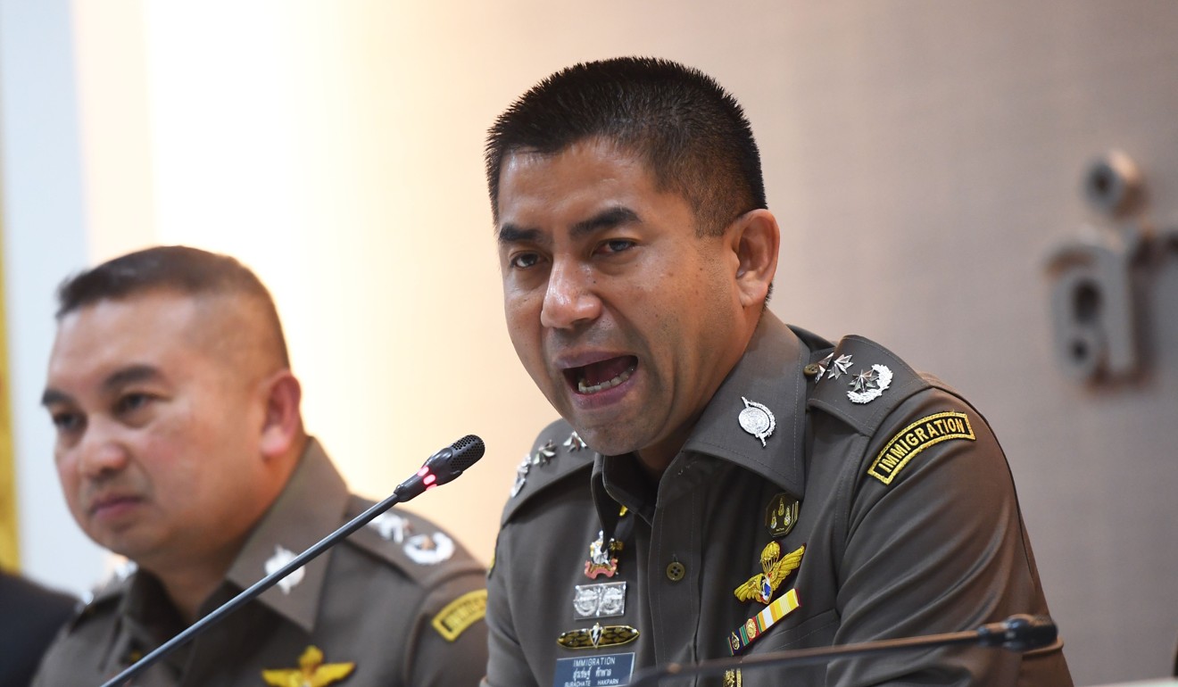 Thai immigration chief Surachet Hakparn (R). Photo: AFP