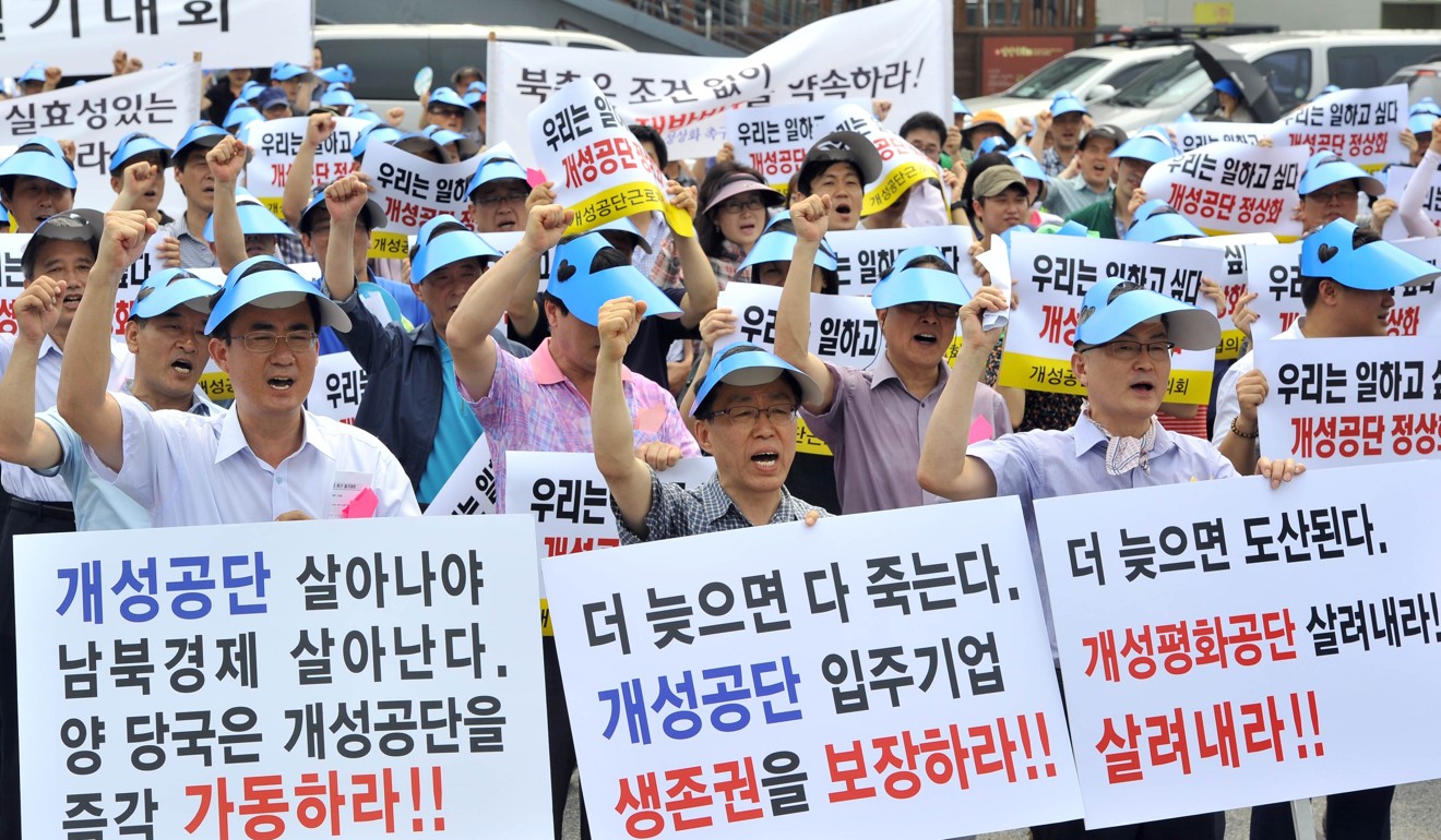 Hundreds of South Korean representatives from Kaesong-based companies at a 2013 rally urging the swift resumption of operations at their abandoned plants. Photo: AFP