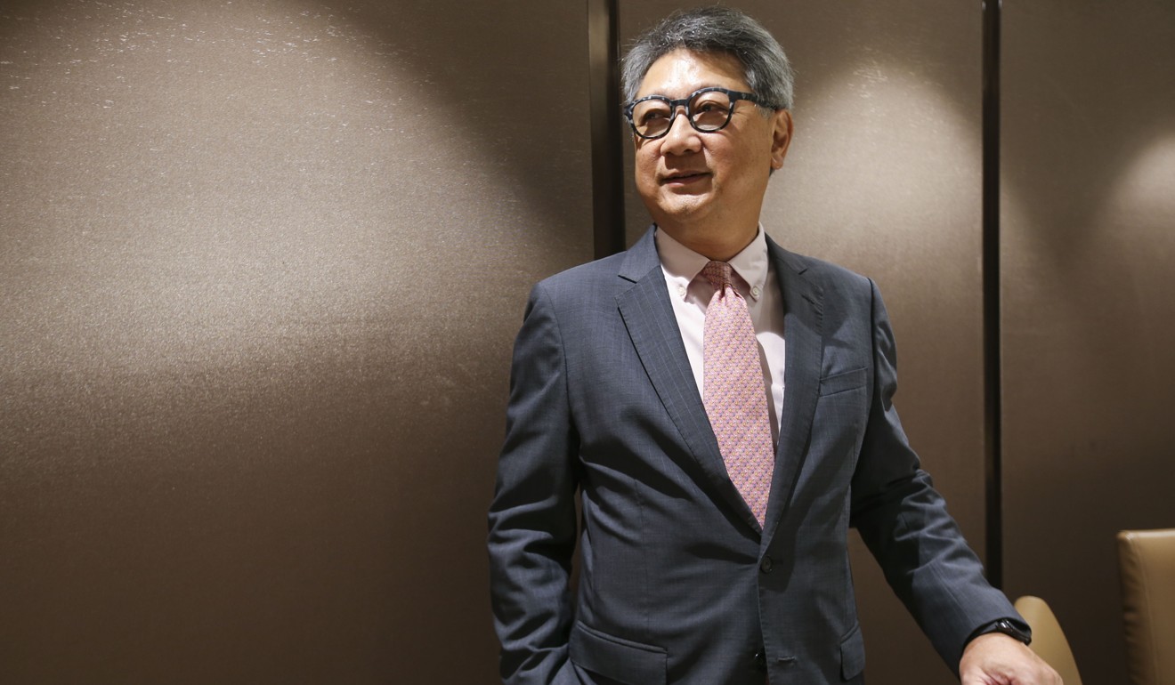 Gary Cheung Wai-kwok, chairman of Hong Kong Securities Association, says the Chinese and Hong Kong stock markets will rise once the US-China trade dispute is resolved. Photo: David Wong