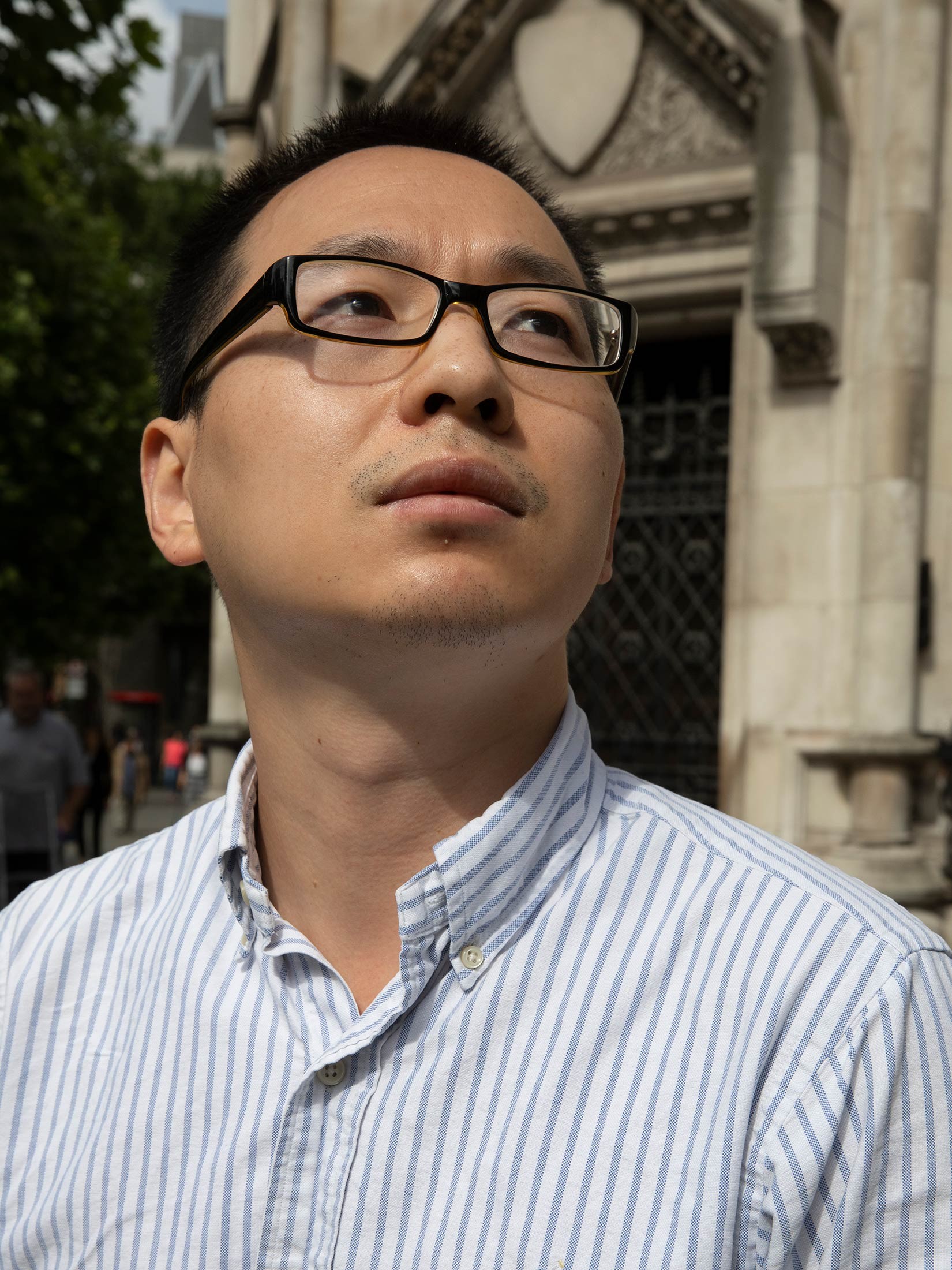 Ke Xu outside the Royal Courts of Justice in London. Picture: Kalpesh Lathigra for Bloomberg Businessweek