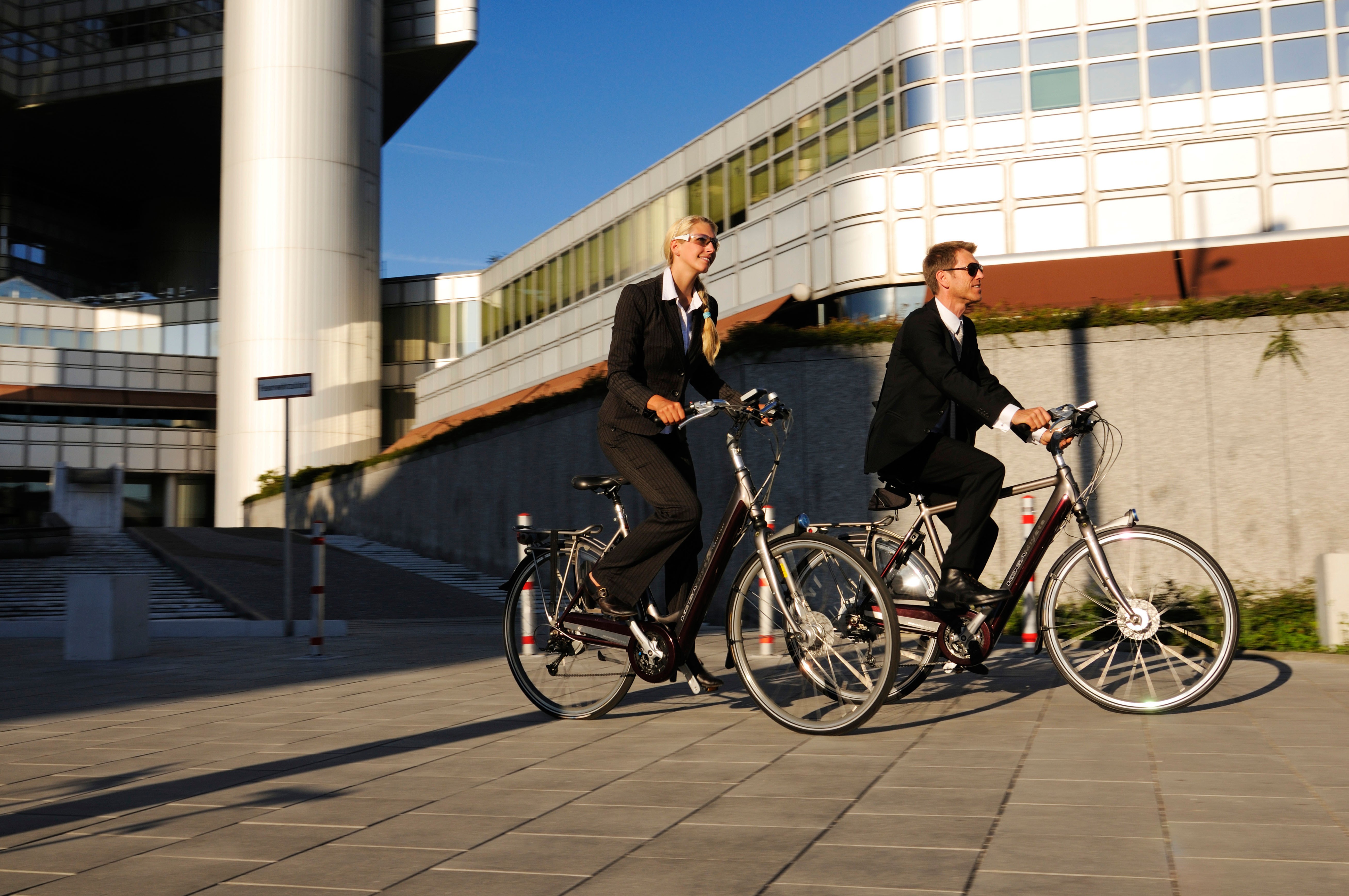 People ride on electric bicycles in Munich, Germany. Photo: Alamy