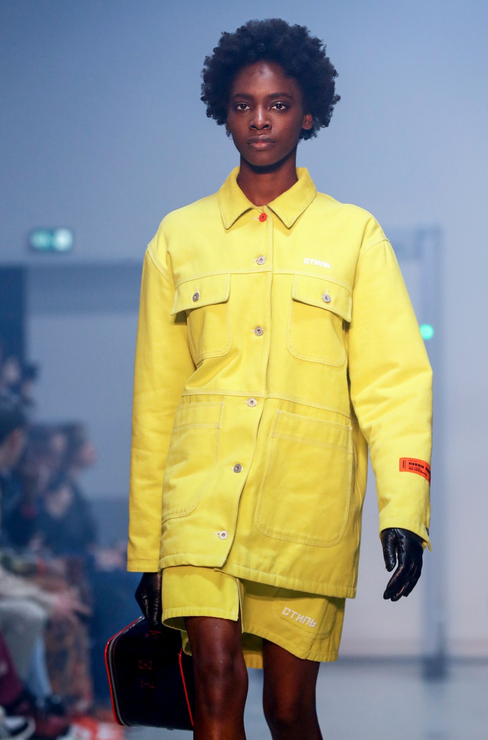 A model presents a Heron Preston creation – with a look inspired by security guard, transport workers’ uniforms and other people who frequent ‘24-hour places’ – during the men’s fall/winter 2019-20 collection show in Paris on Tuesday. Photo: AFP