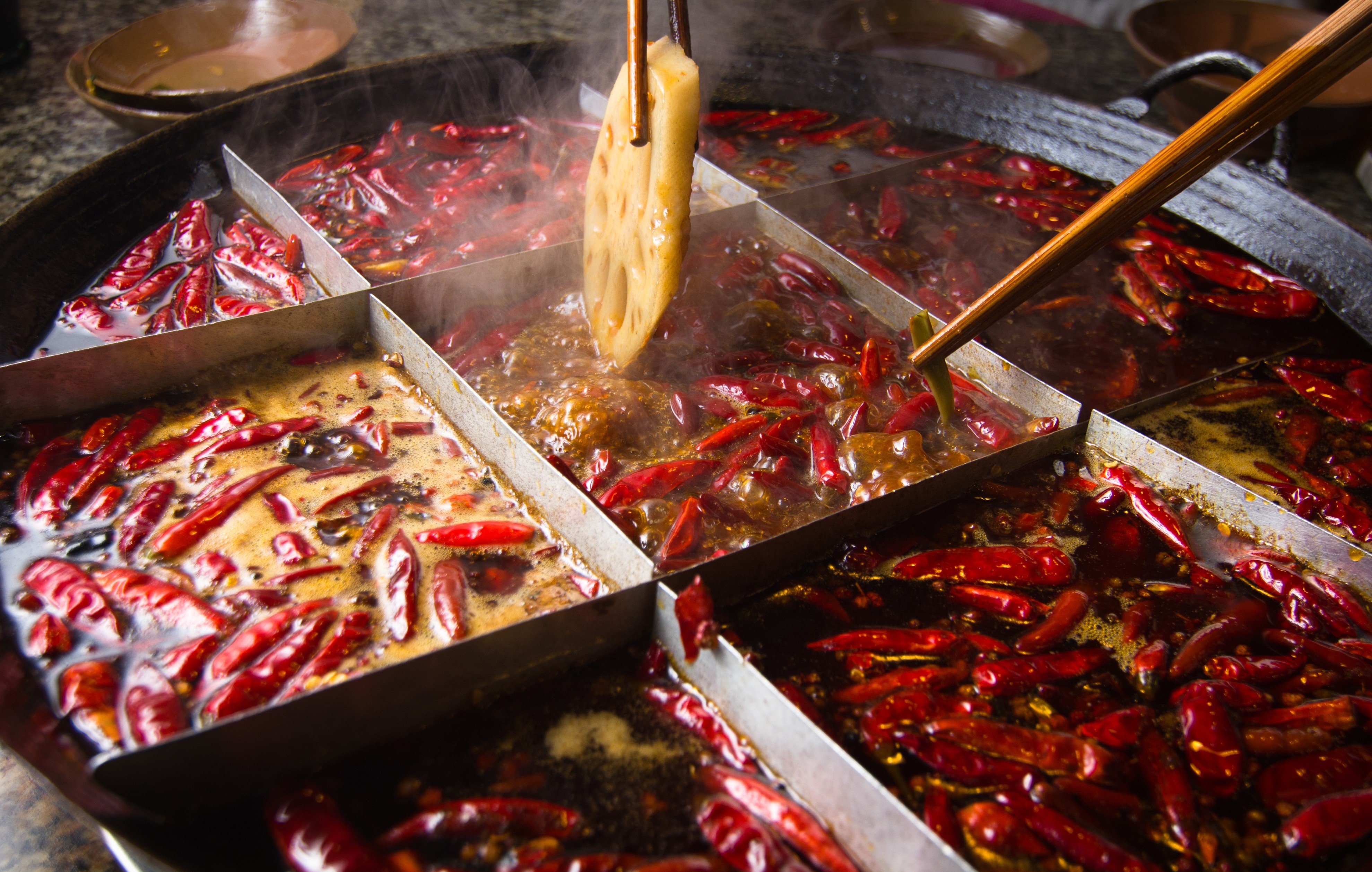 Chongqing hot pot is one of the most famous – and spiciest types – of Chinese hotpot, which is a popular and sociable choice of meal among families and groups of friends as a way to keep warm during the winter months.