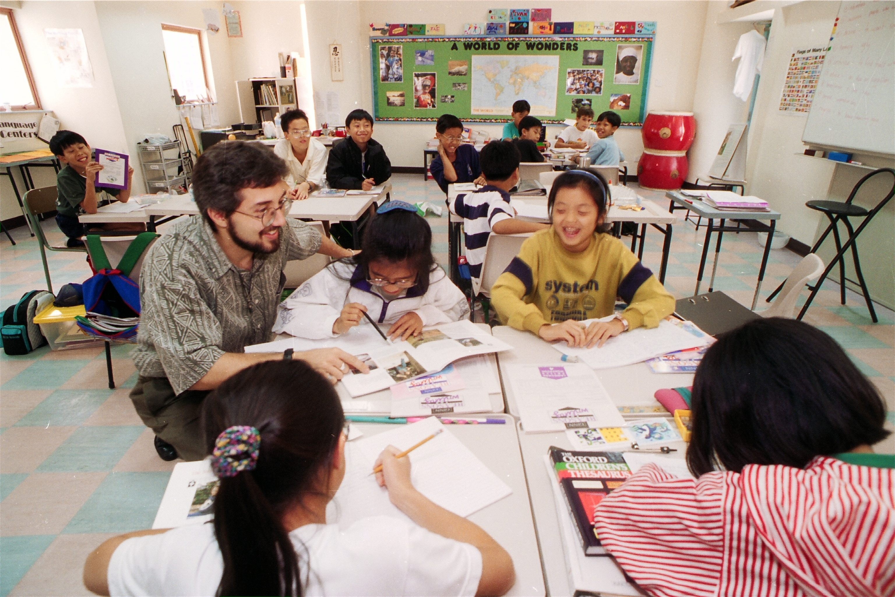 Korean children being taught English by a foreigner. Photo: SCMP
