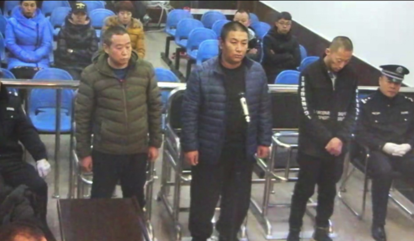 Liu Zhenhua, Wang You and Zhang Wenhui face a court in Harbin in December. All of the 13 men tried in the case were jailed. Photo: Thepaper.cn