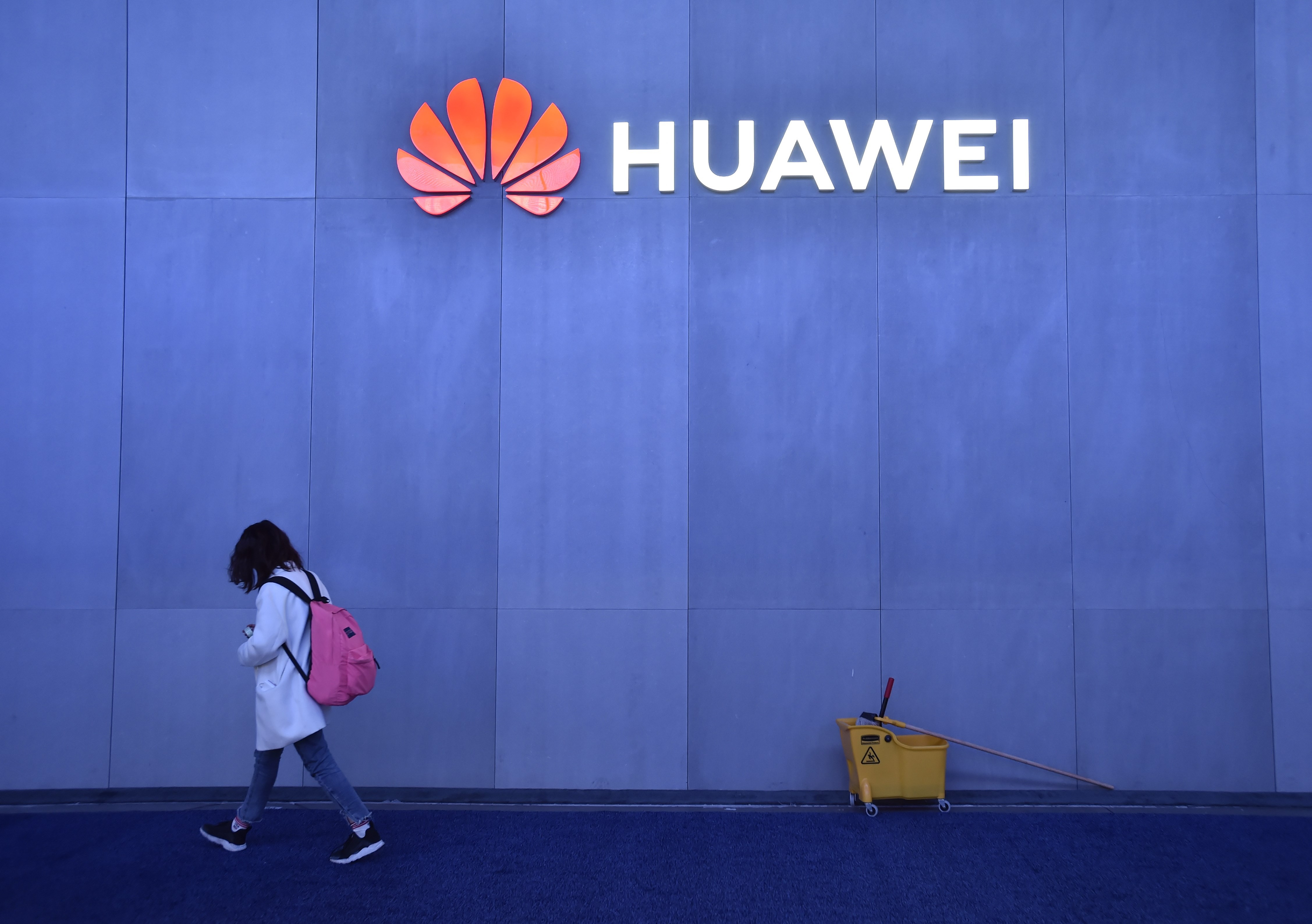 An attendee walks past the Huawei booth at CES 2019, the world's largest annual consumer technology trade show, in Las Vegas on January 8. Photo: AFP
