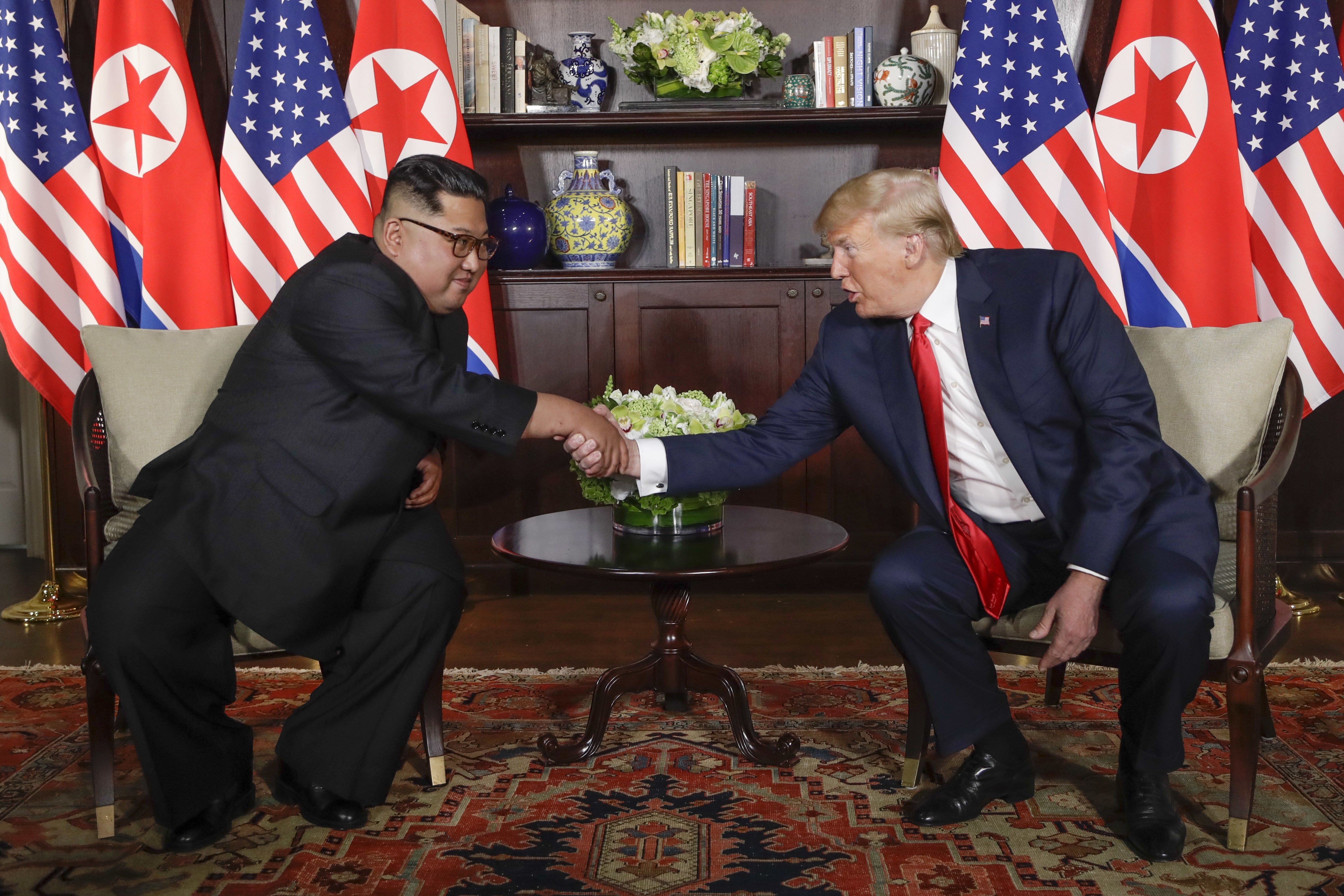 North Korea leader Kim Jong-un and US President Donald Trump shake hands during their meeting in Singapore on June 12. The historic summit drew the eyes of the world, but was criticised for resulting in no significant progress on North Korean denuclearisation. Photo: AP