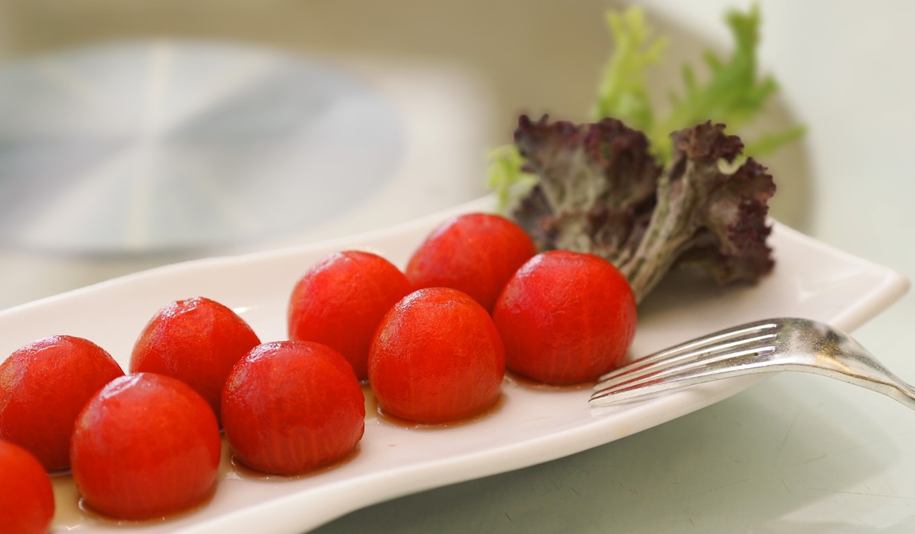Yue restaurant's cherry tomato in pomelo vinegar.