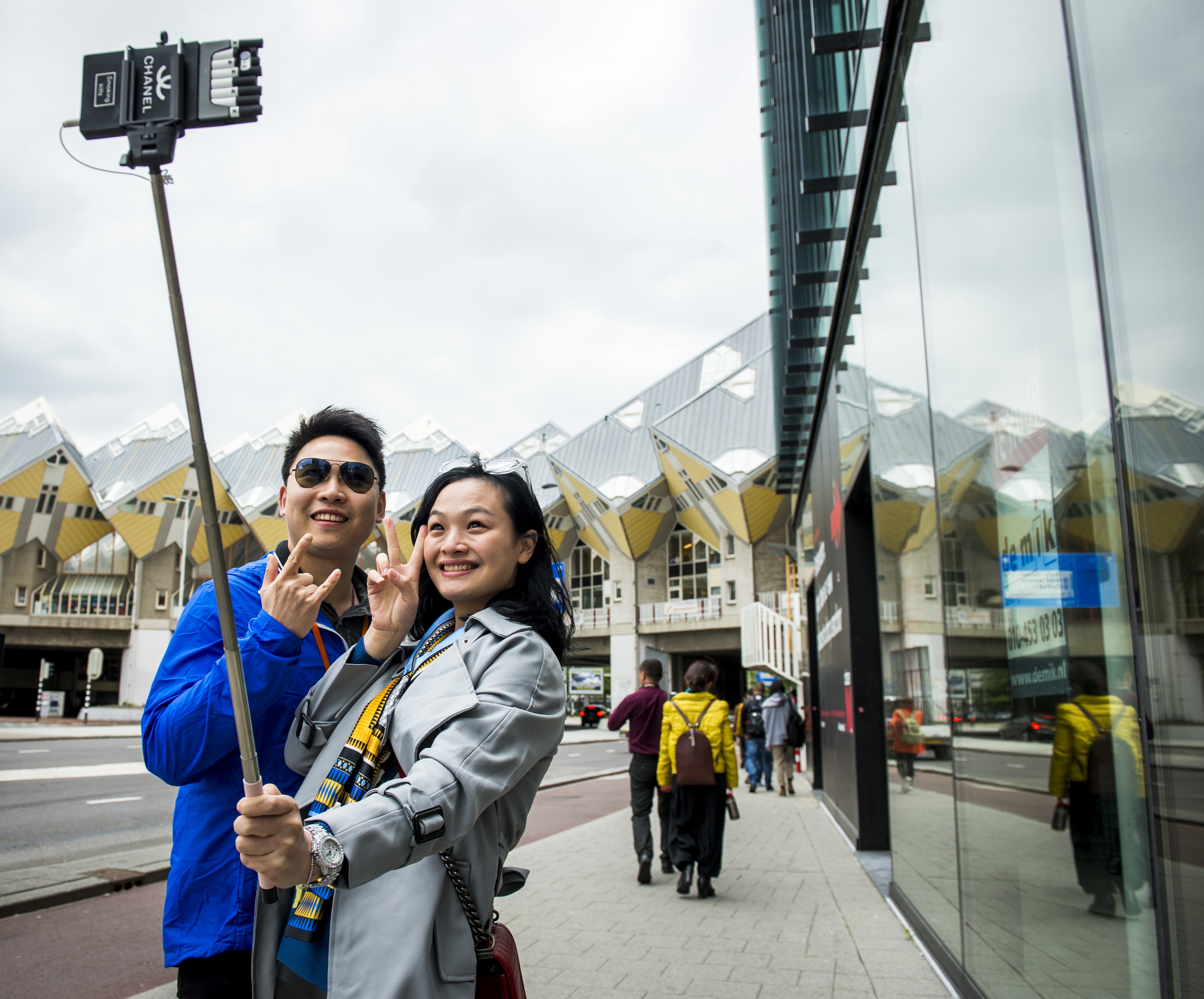 In 2018, Chinese travellers made 140 million outbound trips, a rise of 13.5 per cent from 2017, according to the China Tourism Academy. A Chinese couple earns social media bragging rights with a visit to Rotterdam, Netherlands, on May 25, 2015. Photo: AFP