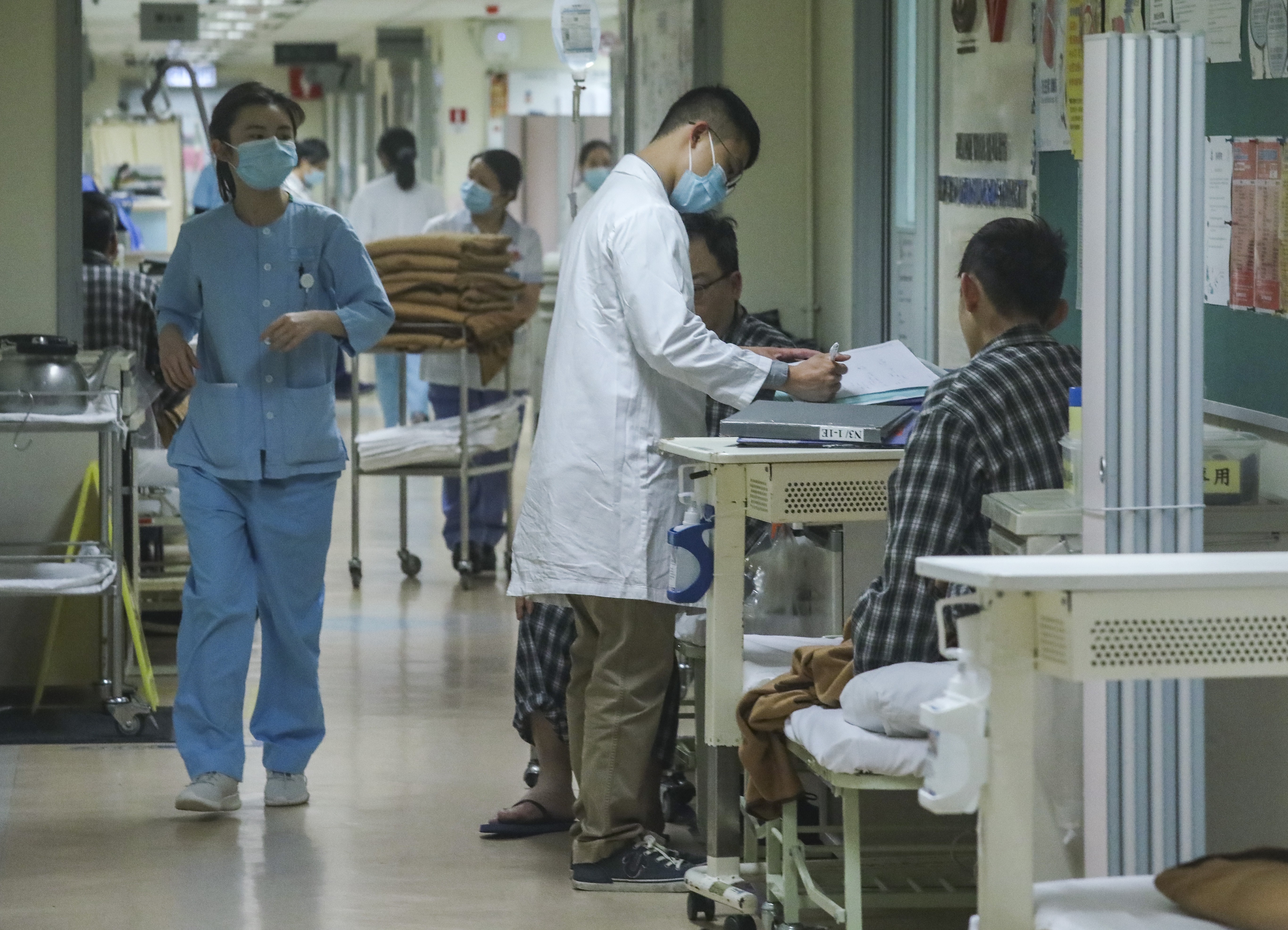 Medical staff at work at Kwong Wah Hospital in Yau Ma Tei amid the winter flu outbreak in January. The city’s public hospitals have seen occupancy rates of over 100 per cent. Photo: Nora Tam