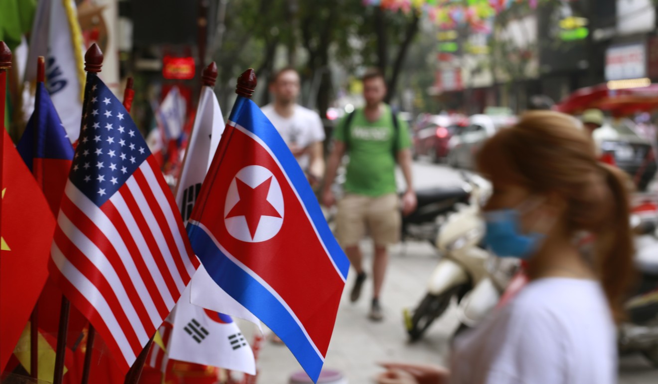 US and North Korean flags on display for sale at a shop in Hanoi, Vietnam. Photo: AP