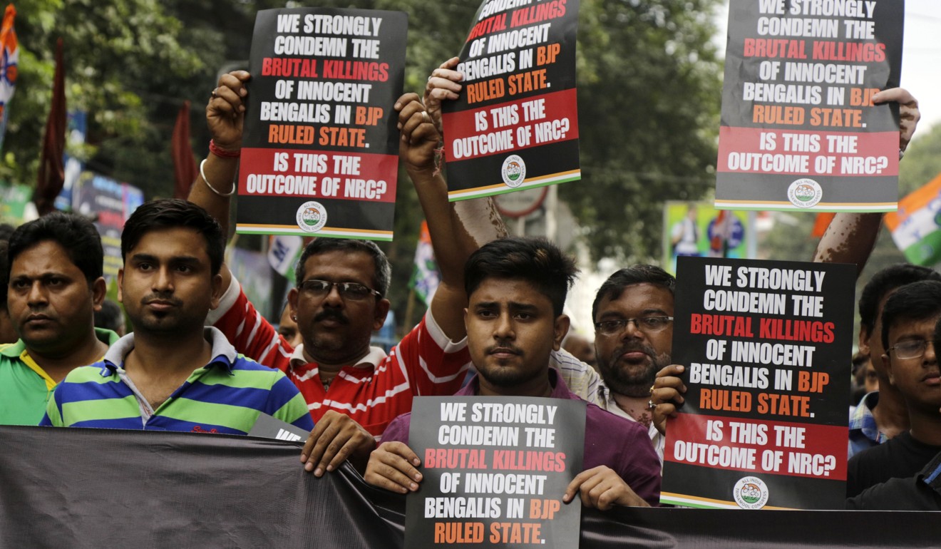 Trinamul Congress Party supporters in Kolkata protesting the killing of five members of a community in Assam, India on November 2, 2018. Photo: AP