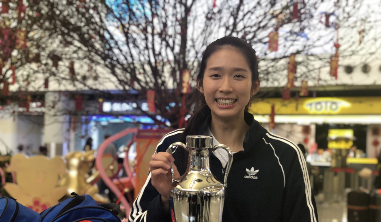 Vivian Kong Man-wai returns with her trophy after winning gold in the Barcelona world cup series. Photo: Chan Kin-wa