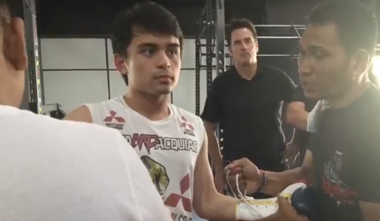 Jimuel Pacquiao tapes up before his fight. Photo: YouTube