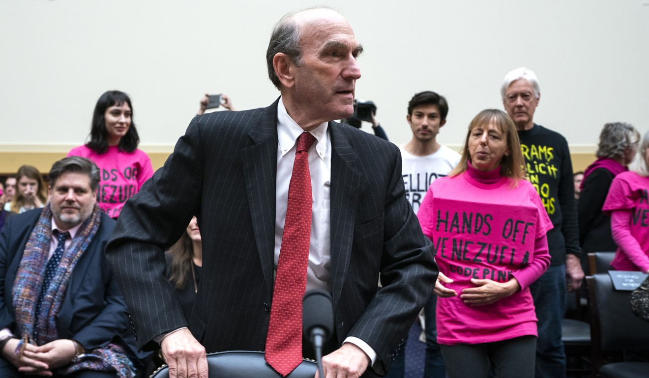 Codepink activists heckling Elliott Abrams, the US special representative for Venezuela, as he prepares to testify before a Foreign Affairs Committee hearing on February 13, 2019. Photo: EPA