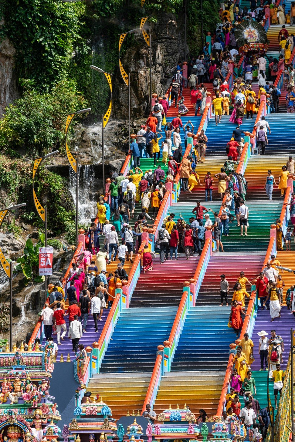 Colourful stairs leading to the Hindu temples at Batu Caves, Kuala Lumpur. Photo: Alamy