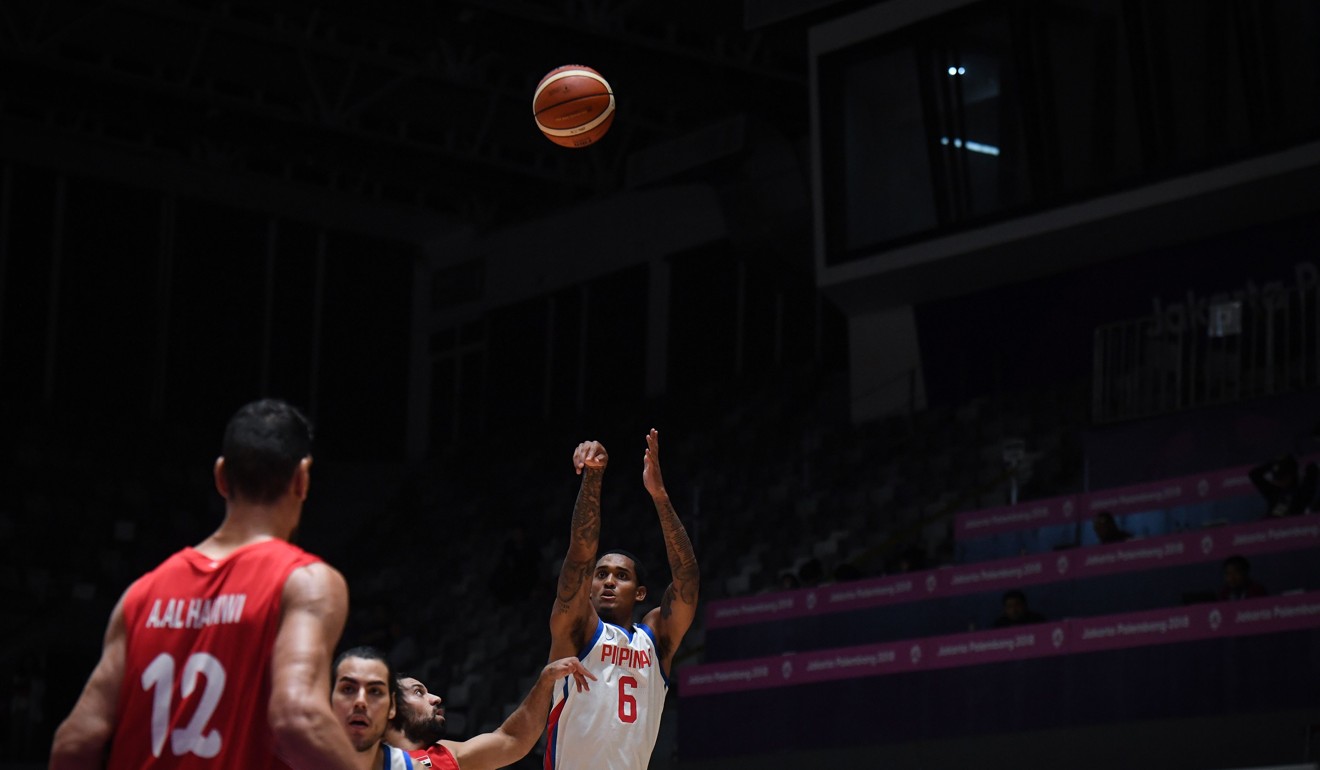 Jordan Clarkson shoots against Syria during the Asian Games in Jakarta. Photo: AFP